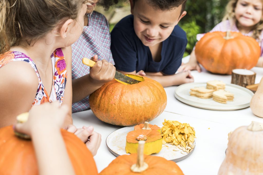 Affordable Fall Activities for Kids Carve Pumpkins